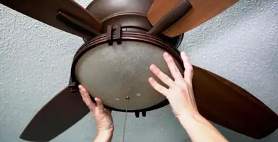 Ceiling fan repair and reinstallation on ceiling mount in San Diego, CA
