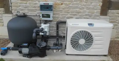 electric heater installation services with connected outdoor heating system equipment in San Diego, CA