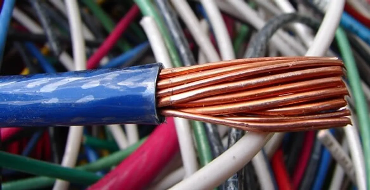 electrical wiring services showing exposed copper conductors and cable preparation in San Diego, CA