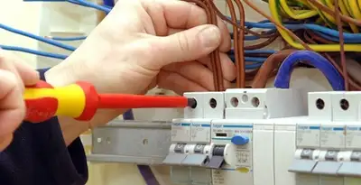 electrician services performing professional electrical panel wiring and connections in San Diego, CA