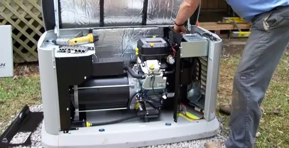 generator installation service showing technician connecting and configuring generator components in San Diego, CA