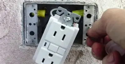 gfci circuits service showing installation of a ground fault circuit interrupter outlet by licensed electricians in San Diego, CA