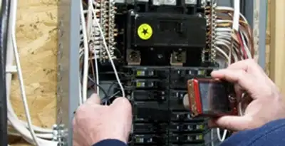 Home electrical inspection of circuit breaker panel by licensed electrician in San Diego, CA