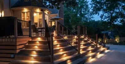 Residential electrician installing outdoor lighting for home safety in San Diego, CA
