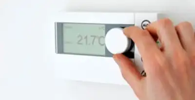 Thermostat installation service with professional adjusting temperature control in San Diego, CA
